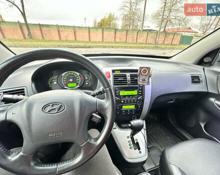 Чорний Хендай Туксон, об'ємом двигуна 2.66 л та пробігом 395 тис. км за 9950 $, фото 17 на Automoto.ua