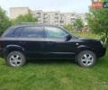 Чорний Хендай Туксон, об'ємом двигуна 1.99 л та пробігом 288 тис. км за 8000 $, фото 1 на Automoto.ua
