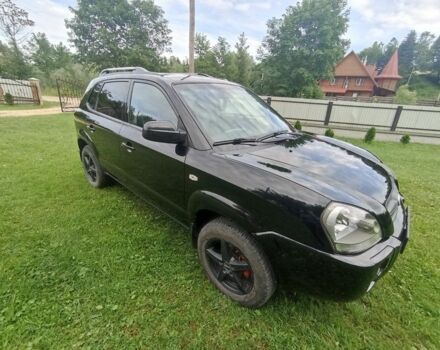 Черный Хендай Туксон, объемом двигателя 2 л и пробегом 220 тыс. км за 8200 $, фото 6 на Automoto.ua