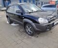Черный Хендай Туксон, объемом двигателя 2 л и пробегом 206 тыс. км за 7555 $, фото 1 на Automoto.ua