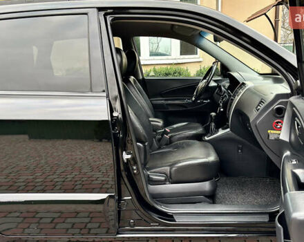 Чорний Хендай Туксон, об'ємом двигуна 2 л та пробігом 182 тис. км за 8299 $, фото 51 на Automoto.ua