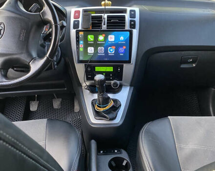 Черный Хендай Туксон, объемом двигателя 1.98 л и пробегом 254 тыс. км за 7700 $, фото 14 на Automoto.ua