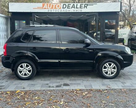 Чорний Хендай Туксон, об'ємом двигуна 2 л та пробігом 110 тис. км за 8750 $, фото 9 на Automoto.ua