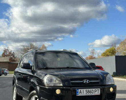 Черный Хендай Туксон, объемом двигателя 2 л и пробегом 300 тыс. км за 8300 $, фото 5 на Automoto.ua