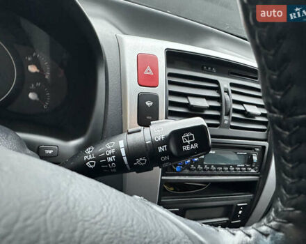 Чорний Хендай Туксон, об'ємом двигуна 2 л та пробігом 243 тис. км за 7999 $, фото 39 на Automoto.ua