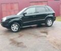 Чорний Хендай Туксон, об'ємом двигуна 2 л та пробігом 225 тис. км за 7850 $, фото 11 на Automoto.ua