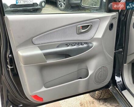 Черный Хендай Туксон, объемом двигателя 2 л и пробегом 117 тыс. км за 7990 $, фото 19 на Automoto.ua