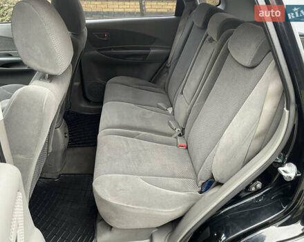 Черный Хендай Туксон, объемом двигателя 2 л и пробегом 107 тыс. км за 8900 $, фото 27 на Automoto.ua