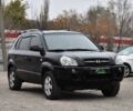 Чорний Хендай Туксон, об'ємом двигуна 2 л та пробігом 204 тис. км за 8650 $, фото 1 на Automoto.ua