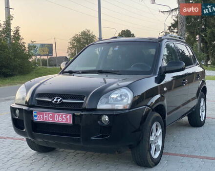 Черный Хендай Туксон, объемом двигателя 2 л и пробегом 250 тыс. км за 7950 $, фото 2 на Automoto.ua
