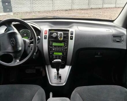 Чорний Хендай Туксон, об'ємом двигуна 2 л та пробігом 185 тис. км за 7499 $, фото 12 на Automoto.ua