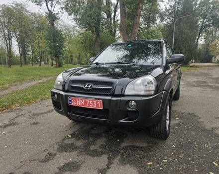 Чорний Хендай Туксон, об'ємом двигуна 2 л та пробігом 186 тис. км за 8300 $, фото 1 на Automoto.ua