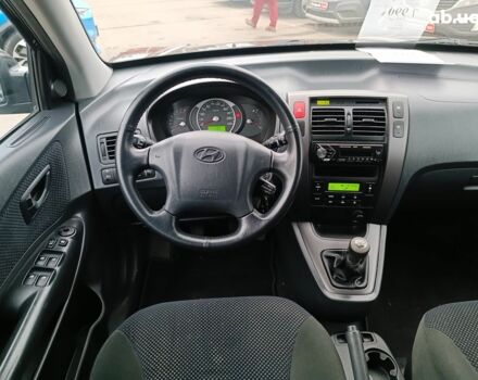 Чорний Хендай Туксон, об'ємом двигуна 2 л та пробігом 192 тис. км за 7990 $, фото 14 на Automoto.ua