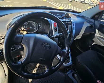 Чорний Хендай Туксон, об'ємом двигуна 1.98 л та пробігом 212 тис. км за 7766 $, фото 13 на Automoto.ua