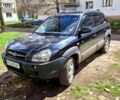 Чорний Хендай Туксон, об'ємом двигуна 2 л та пробігом 154 тис. км за 8700 $, фото 1 на Automoto.ua