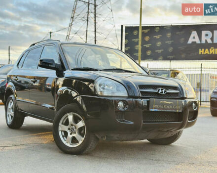 Чорний Хендай Туксон, об'ємом двигуна 2 л та пробігом 186 тис. км за 8300 $, фото 2 на Automoto.ua