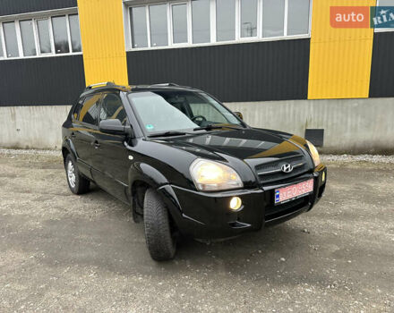 Чорний Хендай Туксон, об'ємом двигуна 2 л та пробігом 243 тис. км за 7999 $, фото 26 на Automoto.ua