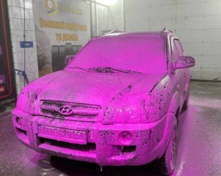 Черный Хендай Туксон, объемом двигателя 2 л и пробегом 220 тыс. км за 7000 $, фото 7 на Automoto.ua