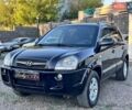 Черный Хендай Туксон, объемом двигателя 2 л и пробегом 230 тыс. км за 7500 $, фото 1 на Automoto.ua