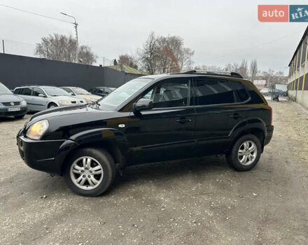 Чорний Хендай Туксон, об'ємом двигуна 2 л та пробігом 243 тис. км за 7999 $, фото 7 на Automoto.ua