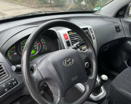 Черный Хендай Туксон, объемом двигателя 2 л и пробегом 136 тыс. км за 8500 $, фото 18 на Automoto.ua