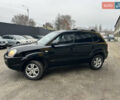 Чорний Хендай Туксон, об'ємом двигуна 2 л та пробігом 243 тис. км за 7999 $, фото 7 на Automoto.ua