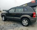 Чорний Хендай Туксон, об'ємом двигуна 2 л та пробігом 225 тис. км за 8000 $, фото 3 на Automoto.ua