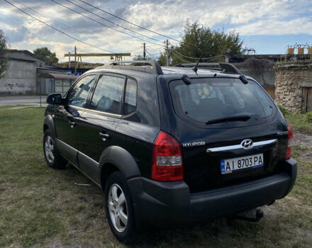 Чорний Хендай Туксон, об'ємом двигуна 2 л та пробігом 231 тис. км за 8200 $, фото 3 на Automoto.ua