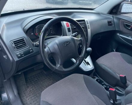 Чорний Хендай Туксон, об'ємом двигуна 2 л та пробігом 110 тис. км за 8750 $, фото 14 на Automoto.ua