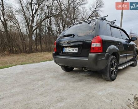 Черный Хендай Туксон, объемом двигателя 2 л и пробегом 182 тыс. км за 9000 $, фото 9 на Automoto.ua