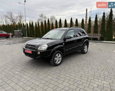 Черный Хендай Туксон, объемом двигателя 1.98 л и пробегом 205 тыс. км за 7950 $, фото 9 на Automoto.ua