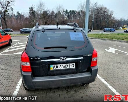 Чорний Хендай Туксон, об'ємом двигуна 2 л та пробігом 106 тис. км за 8350 $, фото 2 на Automoto.ua