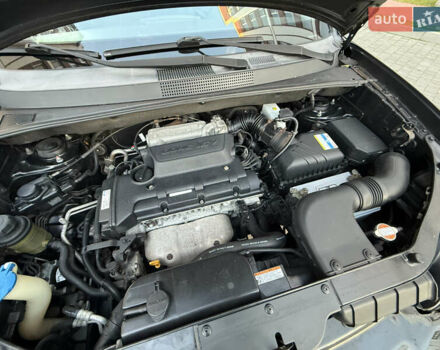 Чорний Хендай Туксон, об'ємом двигуна 2 л та пробігом 156 тис. км за 7850 $, фото 59 на Automoto.ua