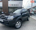 Черный Хендай Туксон, объемом двигателя 1.98 л и пробегом 177 тыс. км за 7600 $, фото 1 на Automoto.ua
