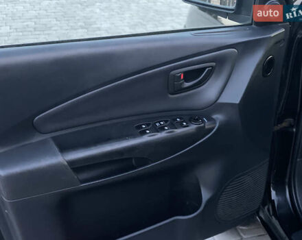 Черный Хендай Туксон, объемом двигателя 2 л и пробегом 250 тыс. км за 7950 $, фото 24 на Automoto.ua
