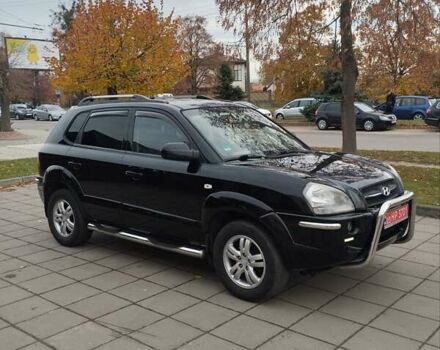 Черный Хендай Туксон, объемом двигателя 1.98 л и пробегом 214 тыс. км за 7700 $, фото 8 на Automoto.ua
