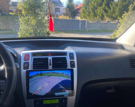 Чорний Хендай Туксон, об'ємом двигуна 1.99 л та пробігом 250 тис. км за 7800 $, фото 6 на Automoto.ua