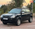 Черный Хендай Туксон, объемом двигателя 2 л и пробегом 361 тыс. км за 6499 $, фото 1 на Automoto.ua
