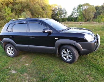 Черный Хендай Туксон, объемом двигателя 2 л и пробегом 162 тыс. км за 8500 $, фото 1 на Automoto.ua