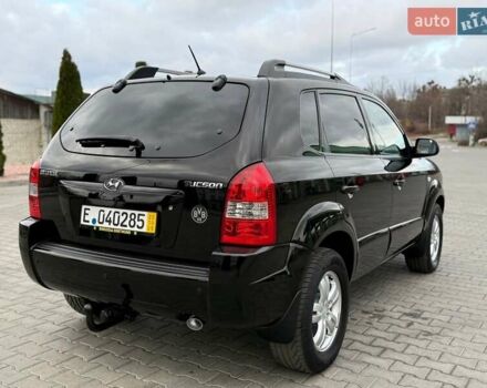 Черный Хендай Туксон, объемом двигателя 1.98 л и пробегом 239 тыс. км за 8700 $, фото 5 на Automoto.ua