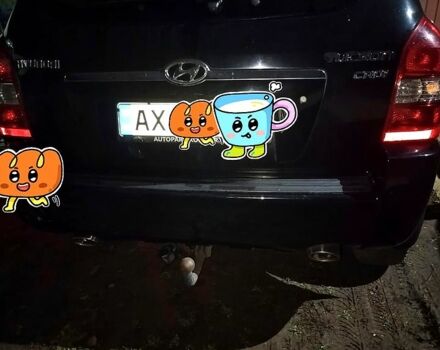 Чорний Хендай Туксон, об'ємом двигуна 2 л та пробігом 226 тис. км за 4720 $, фото 1 на Automoto.ua