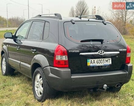 Черный Хендай Туксон, объемом двигателя 2 л и пробегом 148 тыс. км за 9500 $, фото 4 на Automoto.ua