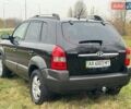 Черный Хендай Туксон, объемом двигателя 2 л и пробегом 148 тыс. км за 9500 $, фото 4 на Automoto.ua