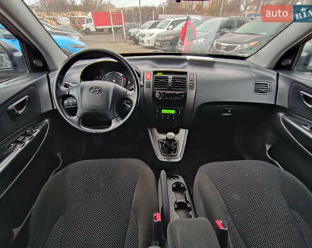 Черный Хендай Туксон, объемом двигателя 2 л и пробегом 192 тыс. км за 7990 $, фото 13 на Automoto.ua