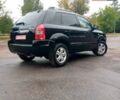 Чорний Хендай Туксон, об'ємом двигуна 2 л та пробігом 225 тис. км за 7850 $, фото 1 на Automoto.ua