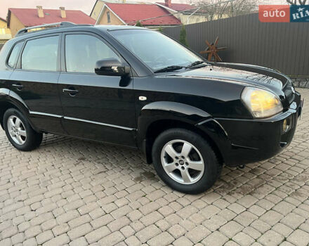 Черный Хендай Туксон, объемом двигателя 2 л и пробегом 276 тыс. км за 7450 $, фото 5 на Automoto.ua