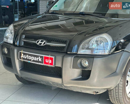Черный Хендай Туксон, объемом двигателя 2.7 л и пробегом 158 тыс. км за 7940 $, фото 4 на Automoto.ua