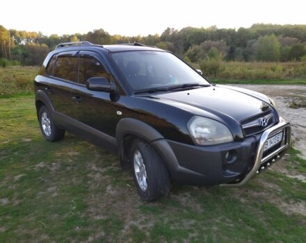 Черный Хендай Туксон, объемом двигателя 2 л и пробегом 162 тыс. км за 8500 $, фото 16 на Automoto.ua