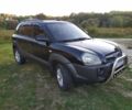 Черный Хендай Туксон, объемом двигателя 2 л и пробегом 162 тыс. км за 8500 $, фото 16 на Automoto.ua