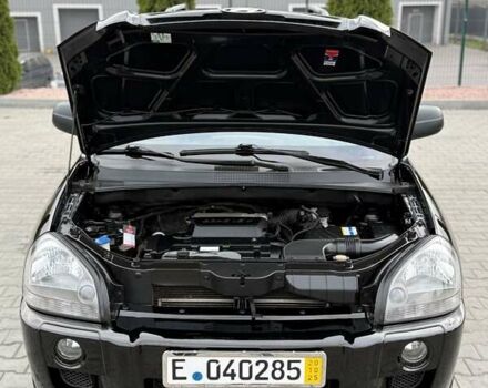 Черный Хендай Туксон, объемом двигателя 1.98 л и пробегом 239 тыс. км за 8700 $, фото 15 на Automoto.ua